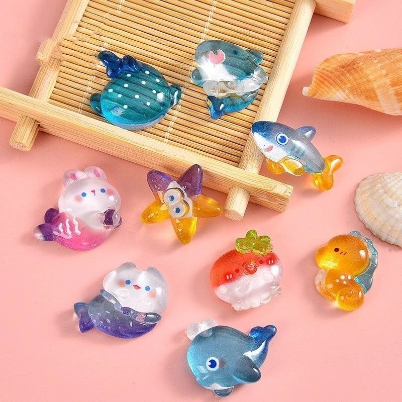 [100 ชิ้นในสต็อก] อุปกรณ์เรซินนางเงือกในมหาสมุทร DIY ชุดวัสดุเคสโทรศัพท์ ตกแต่งด้วยครีมกาวปลาโลมาและฉลาม