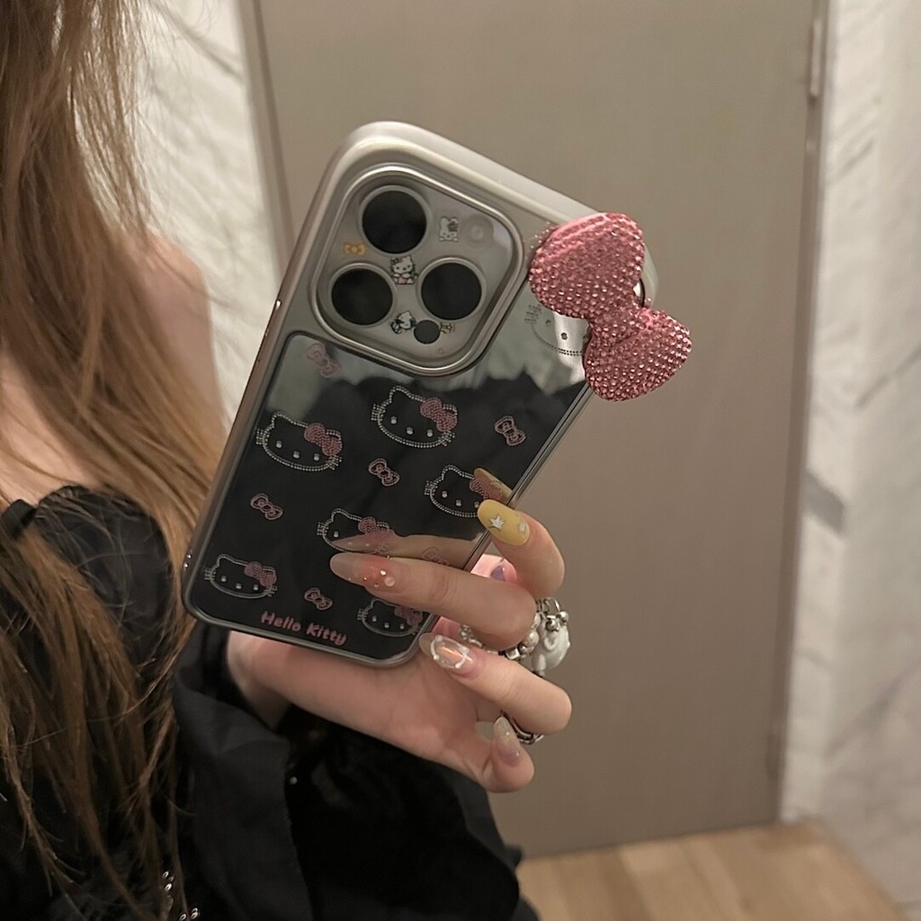 Huiwanju สายโบว์สีชมพู kt cat เหมาะสําหรับ iPhone16pro เคสโทรศัพท์มือถือใหม่ iphone15promax ง่าย 14plus สาวหัวใจ 13 ผู้หญิง 12pro กระจกป้องกันกรณี