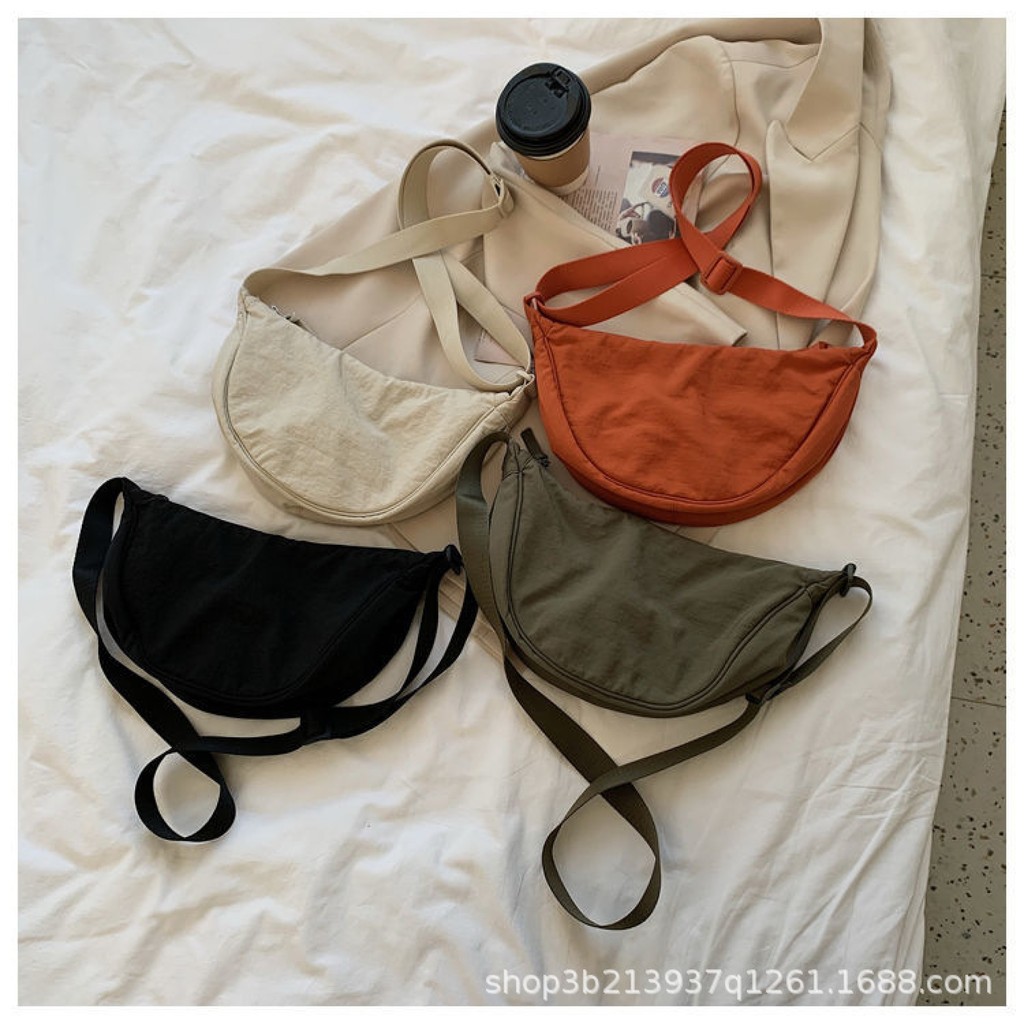 U ห้องลองครอบครัวพร้อมกระเป๋า messenger หญิงหนังสือสีแดงขนาดเล็กถุงเกี๊ยวไนลอนกระเป๋าสะพายนักเรียนถุ