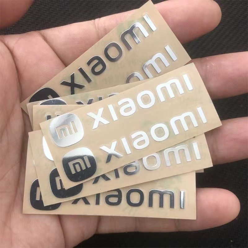ใช้ได้กับสติ๊กเกอร์โลโก้รถ Xiaomi Su7 ตกแต่ง 3D สเตอริโอ บุคลิกภาพ สติ๊กเกอร์โลหะสร้างสรรค์ ติดได้ฟรี คอลเลคชันอุปกรณ์ตกแต่งภายใน HMTY