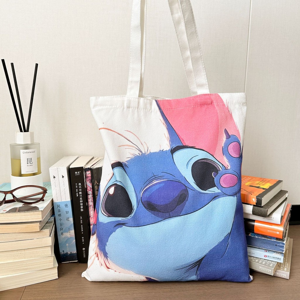 Lilo & Stitch กระเป๋าถือกระเป๋าสะพายผ้าใบ Crossbody Shopping Bag ความจุขนาดใหญ่ Lilo และ Stitch กระเป๋าเก็บนักเรียน ราคา ถูกที่สุด ดีลบีเคเค แกลเลอรีภาพที่ 6