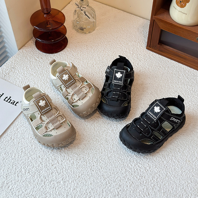 เด็กรองเท้าชายหาดนิ้วเท้าหมวกสบายๆสําหรับชายหญิงรองเท้าแตะโหลออกนุ่ม2025ฤดูร้อนใหม่เด็กวัยหัดเดินรองเท้าแฟชั่นลื่น