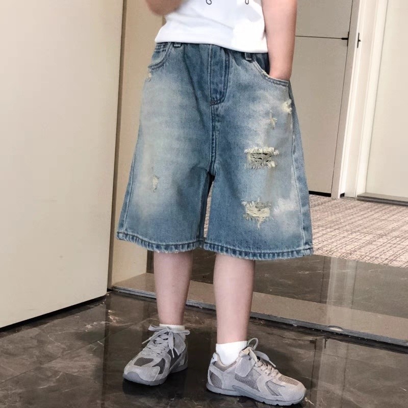 สาวสไตล์ตะวันตกฉีกกางเกงยีนส์กางเกงรุ่นหลวม 2025 ฤดูใบไม้ผลิฤดูร้อนสไตล์ใหม่เสื้อผ้าเด็ก