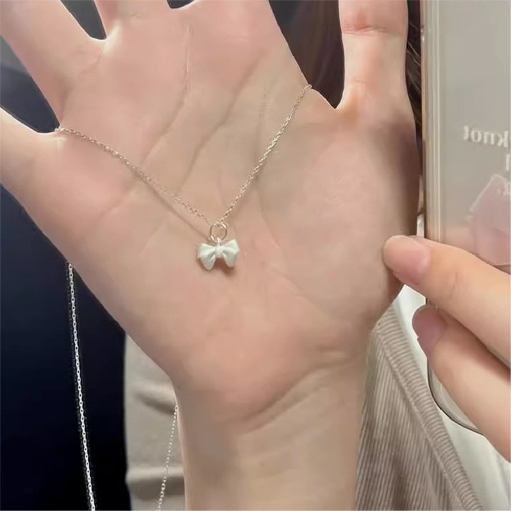 Retro Silver Matte Bow สร้อยคอน่ารักสำหรับสาวๆ Simple Clavicle Chain ของขวัญวันเกิดและ.party สไตล์เกาหลี ราคา ถูกที่สุด ดีลบีเคเค แกลเลอรีภาพที่ 5