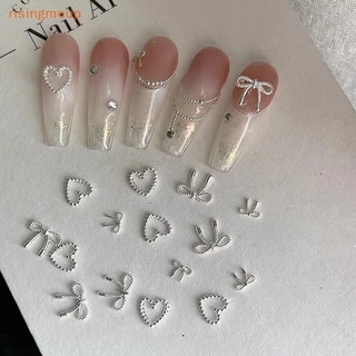 [risingmeup] 10 ชิ้นโลหะผสม Bowknot Love Nails Art Charms ตกแต่ง 3D โลหะหรูหรา Silver Bows รูป Jewellery DIY เล็บออกแบบอุปกรณ์ใหม่