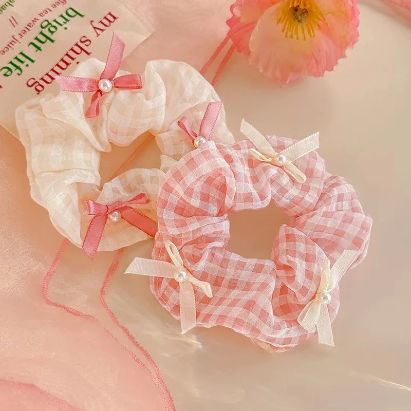 ยางรัดผมโทนสีชมพูน่ารักๆ ติดโบว์ พร้อมส่ง