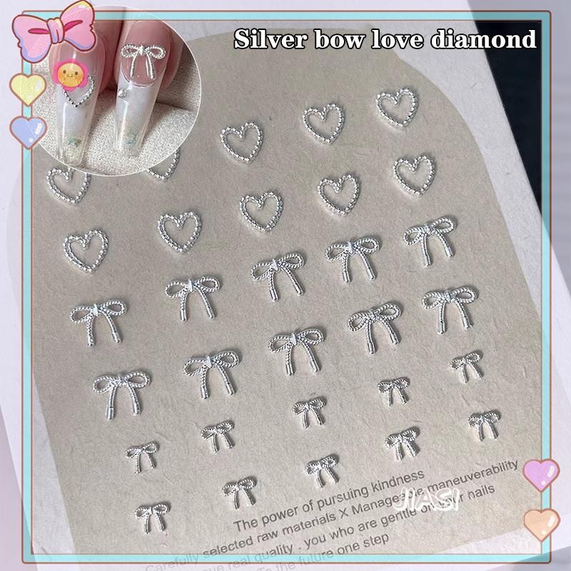 [ความงาม] 10 ชิ้นโลหะผสม Bowknot Love เล็บ Art Charms ตกแต่ง 3D โลหะหรูหราโบว์เงินรูป Jewellery DIY เล็บออกแบบอุปกรณ์ {ขาย}