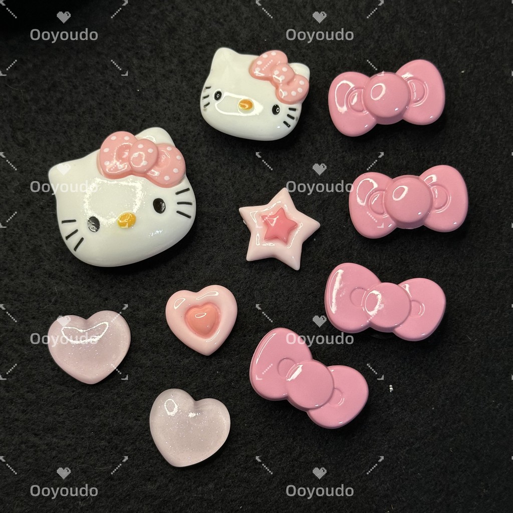 Shining KT หัวแมวสีชมพูผ้าไหมริบบิ้นชุด KT Cat Series clog Pins INS Charm ปุ่ม DIY อุปกรณ์เสริมสําหร
