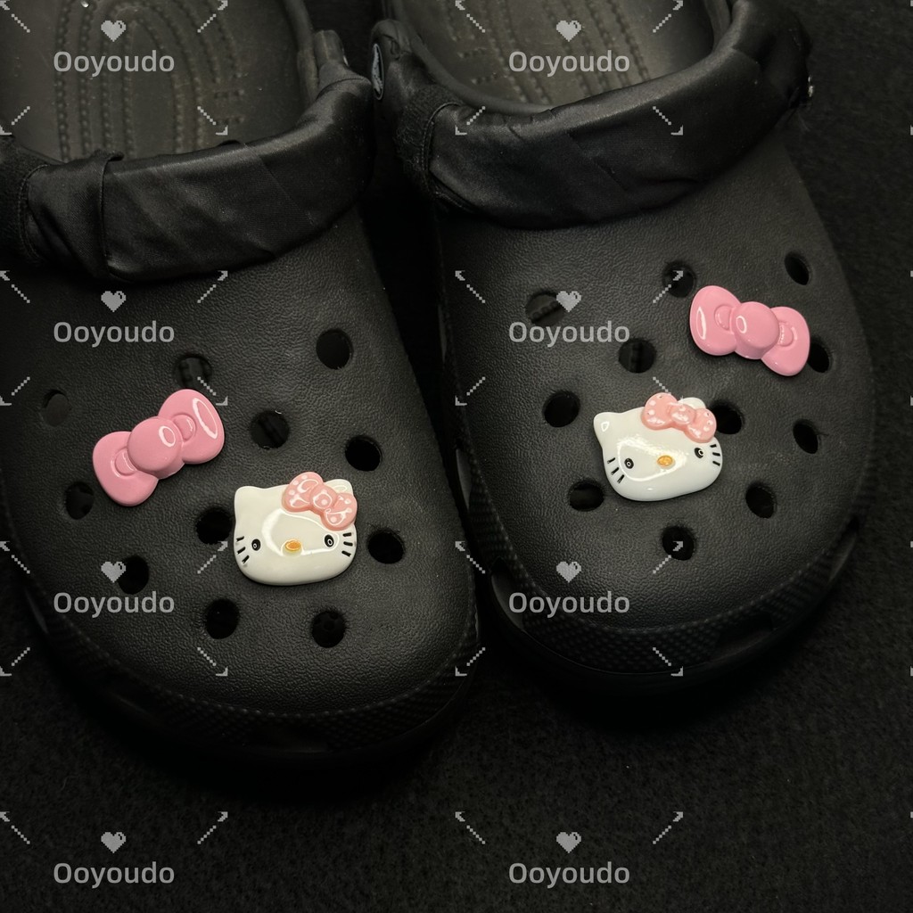 KT Cat Pink Star Love ชุดริบบิ้น Hello Kitty Series clog Pins INS Charm ปุ่ม DIY อุปกรณ์เสริมสําหรับหัวเข็มขัดรองเท้าอุปกรณ์เสริมตกแต่งรองเท้า - รูปที่ 5