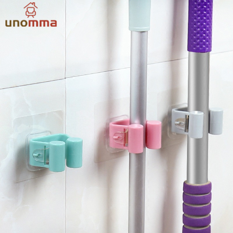 🎈แร็คจัดเก็บ อุปกรณ์จัดเก็บไม้กวาด ไม้ถูพื้นในบ้าน unomma