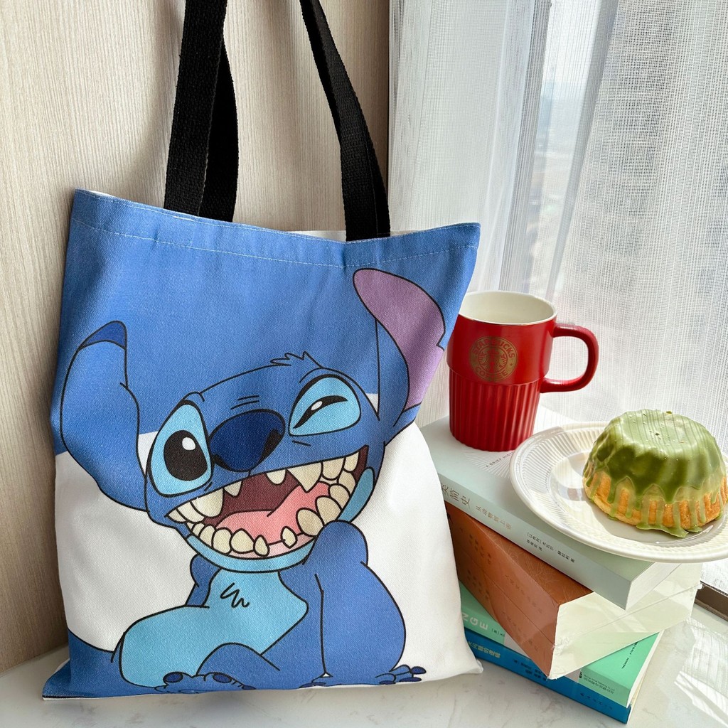 Lilo & Stitch กระเป๋าถือกระเป๋าสะพายผ้าใบ Crossbody Shopping Bag ความจุขนาดใหญ่ Lilo และ Stitch กระเป๋าเก็บนักเรียน ราคา ถูกที่สุด ดีลบีเคเค แกลเลอรีภาพที่ 7