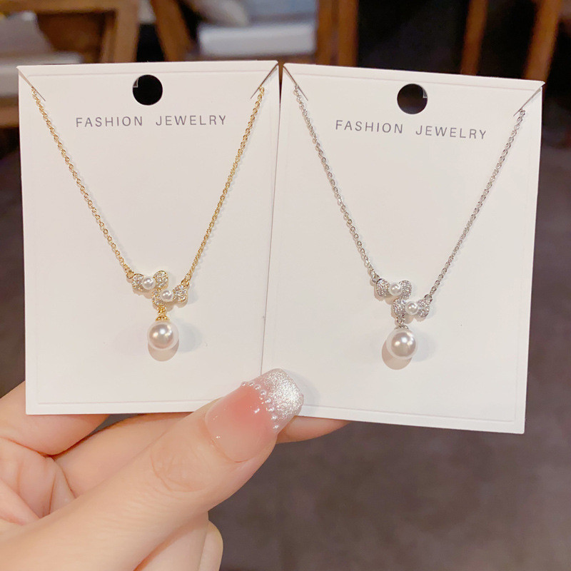 ใหม่เพทายโบว์มุกจี้แฟชั่นออกแบบสร้อยคอโซ่กระดูกไหปลาร้าขายส่ง