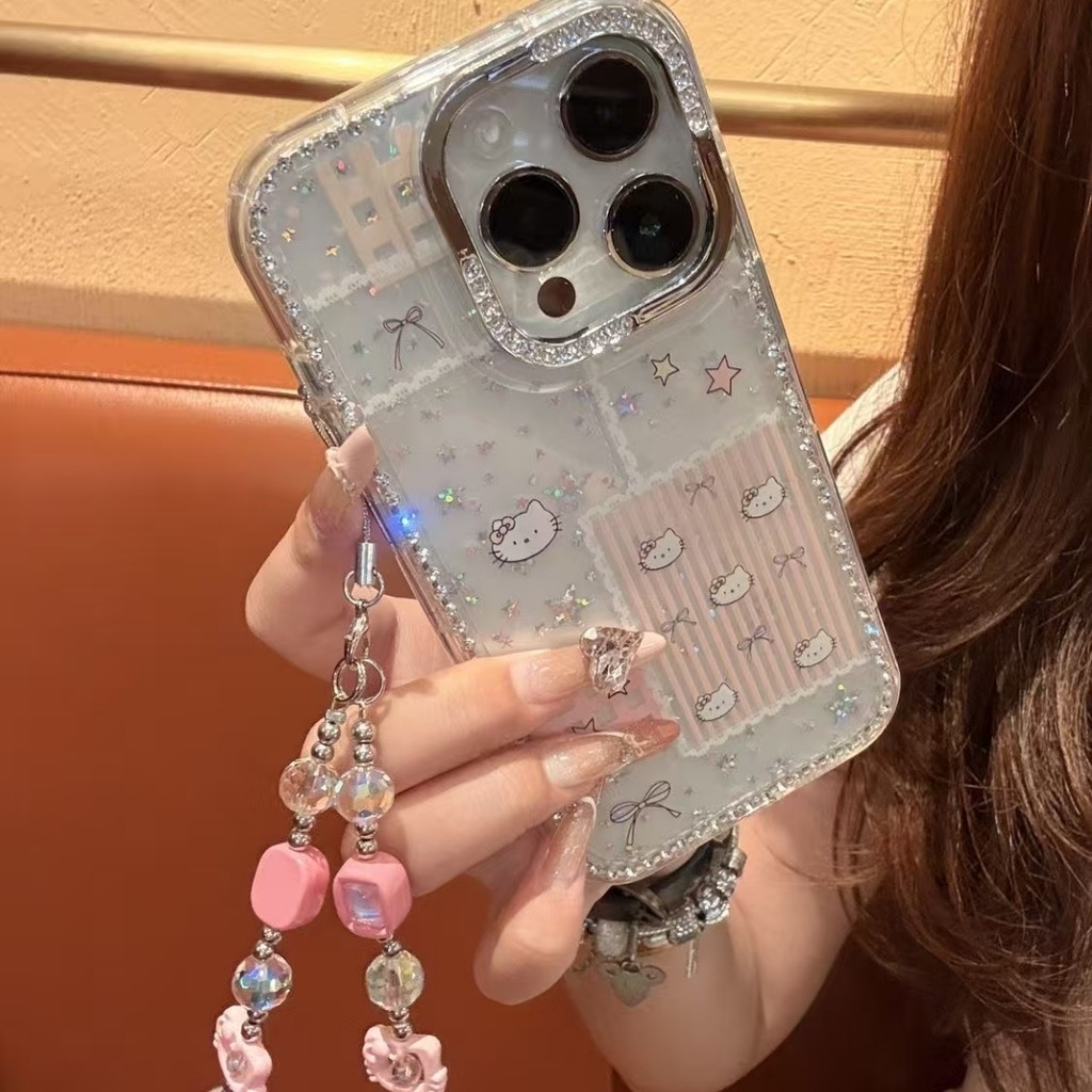 Huiwanju edge เจาะ star glitter kt cat ที่ใช้งานได้ iPhone16promax เคสโทรศัพท์มือถือ 15 รวมทุกอย่าง anti-drop 14 โปร่งใสและเรียบง่าย 13 เชือกเส้นเล็ก 12promax ความรู้สึกขั้นสูง