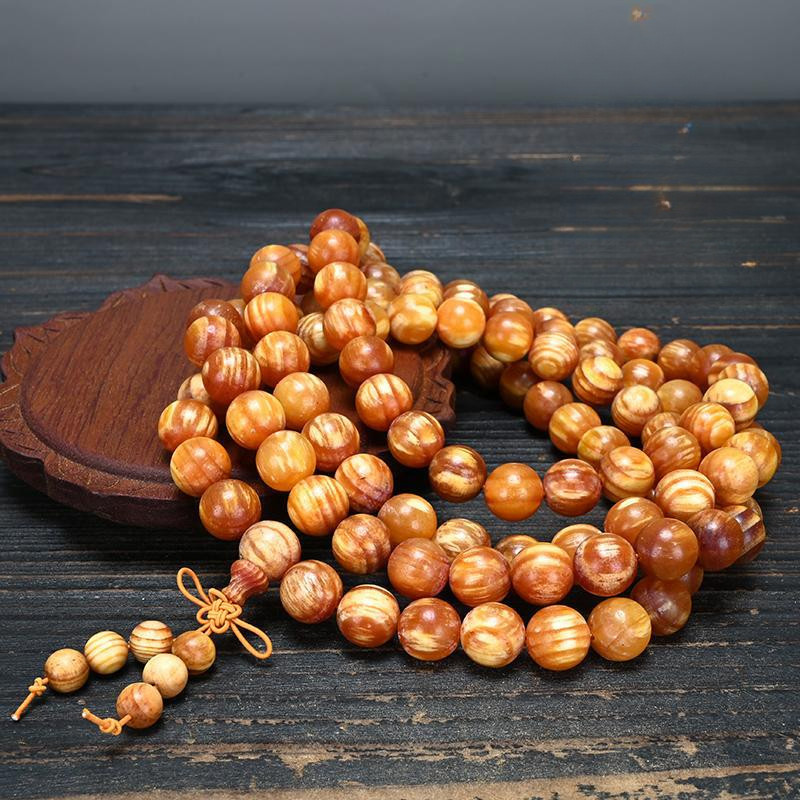 ไม้อำพันตะวันออกเฉียงเหนือ ไม้สนภูเขาฉางไป๋ ไม้หมิงซี น้ำมันเต็ม ไม้เลือดน้ำมังกรโปร่งแสง 108 เม็ดสวดมนต์ ลูกปัดพระพุทธเจ้า 20 เม็ด สร้อยข้อมือ