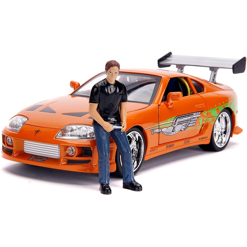 JADA TOYS 1/18 Fast & Furious 1995 Toyota Supra Orange with Brian O'Conner Figure Light/Tail Lamp Fu