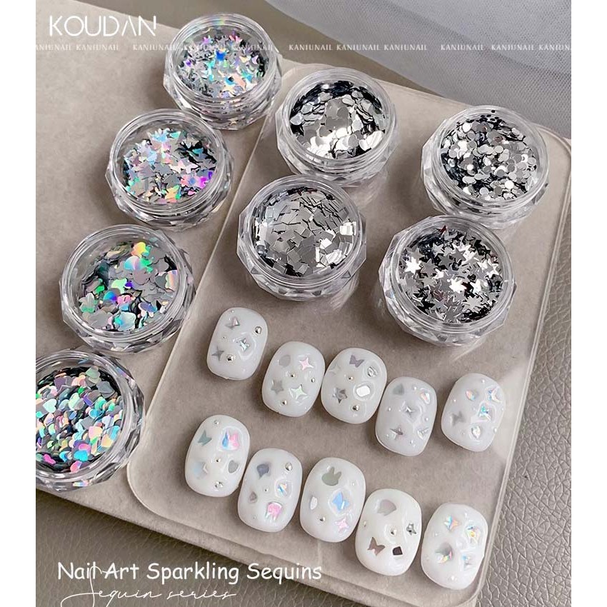 Nail Art สติ๊กเกอร์ติดเล็บเลื่อมตกแต่ง Star Love Heart ผีเสื้อเลเซอร์เงินเงาชนิดบรรจุกล่อง KOUDAN