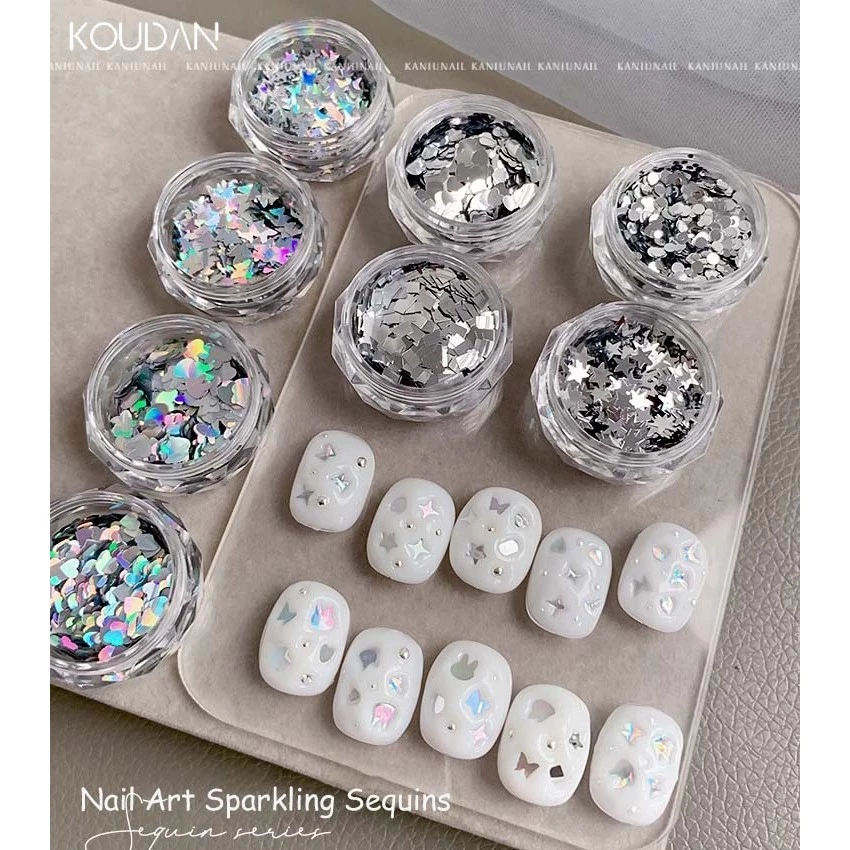 Nail Art สติ๊กเกอร์ติดเล็บเลื่อมตกแต่ง Star Love Heart ผีเสื้อเลเซอร์เงินเงาชนิดบรรจุกล่อง KOUDAN
