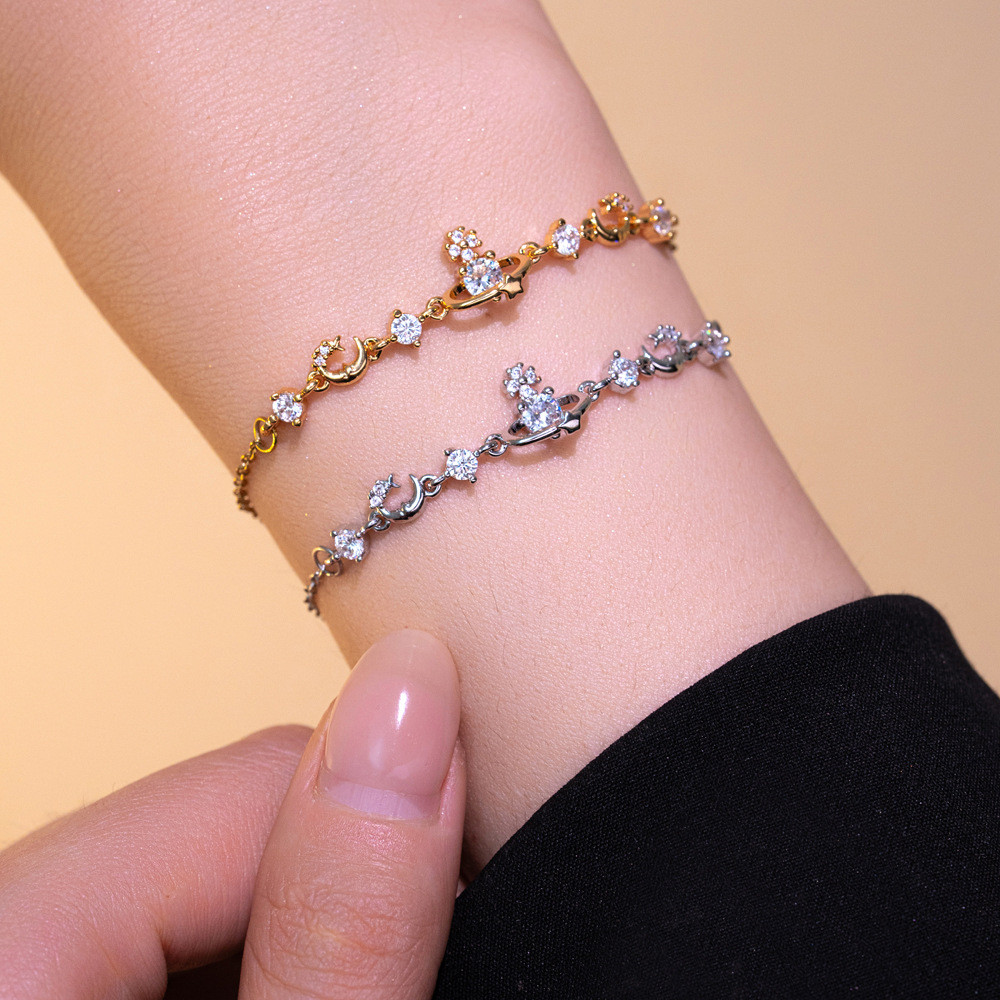 ประณีต All-Match Zircon Diamond-Studded Saturn Design สร้อยข้อมือแฟชั่นหรูหราสร้อยข้อมือเครื่องประดับ