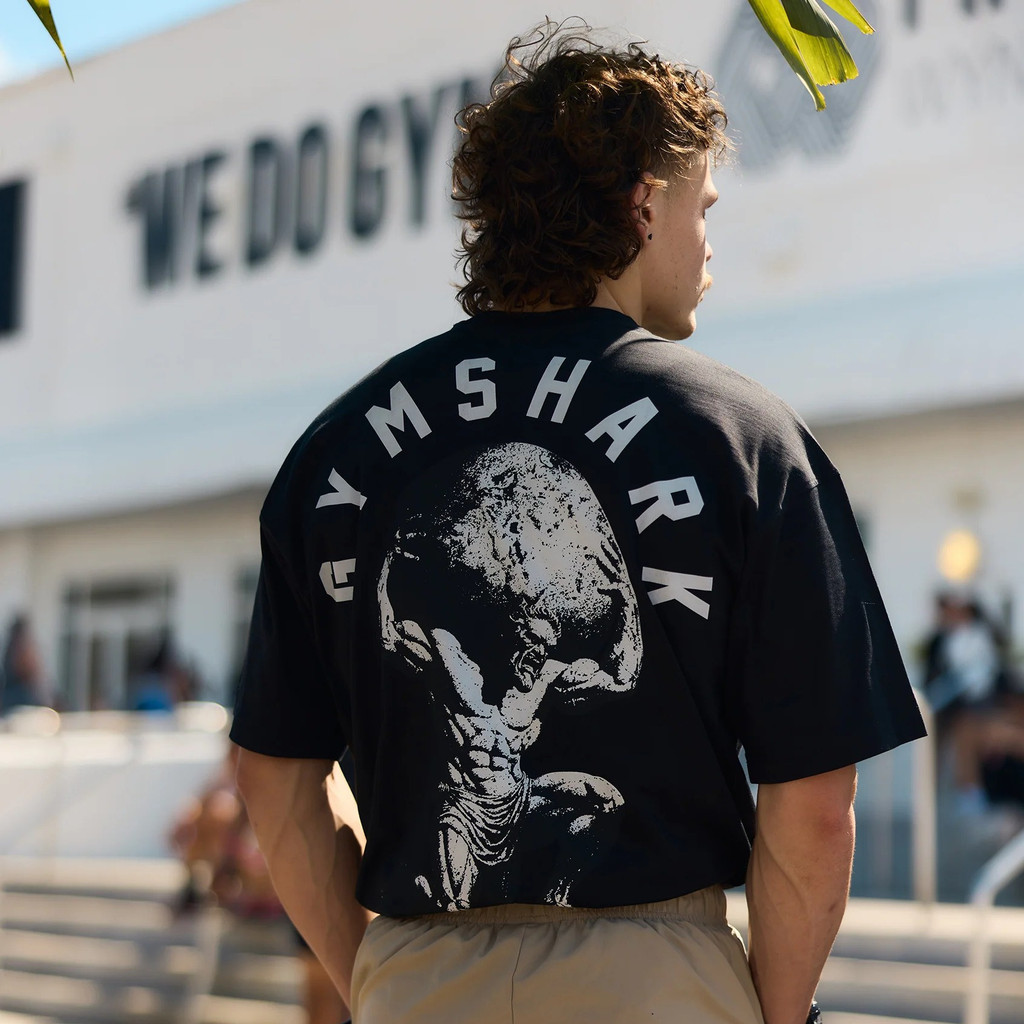 Gymshark Optimus ATLAS เสื้อยืดแขนสั้นฟิตเนสหลวม