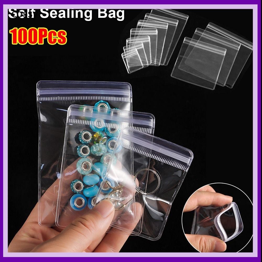 COSSY 100 ชิ้นถุงปิดผนึกด้วยตนเอง,โปร่งใสกันฝุ่นซิปล็อคกระเป๋า,พลาสติก PVC ทนทานซ้ํากระเป๋าเครื่องประดับสร้อยคอสร้อยข้อมือแหวน