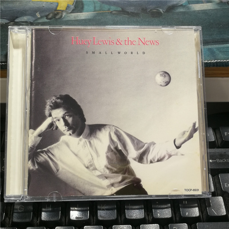 G5415: Huey Lewis & The News-Small World [ของสะสม]