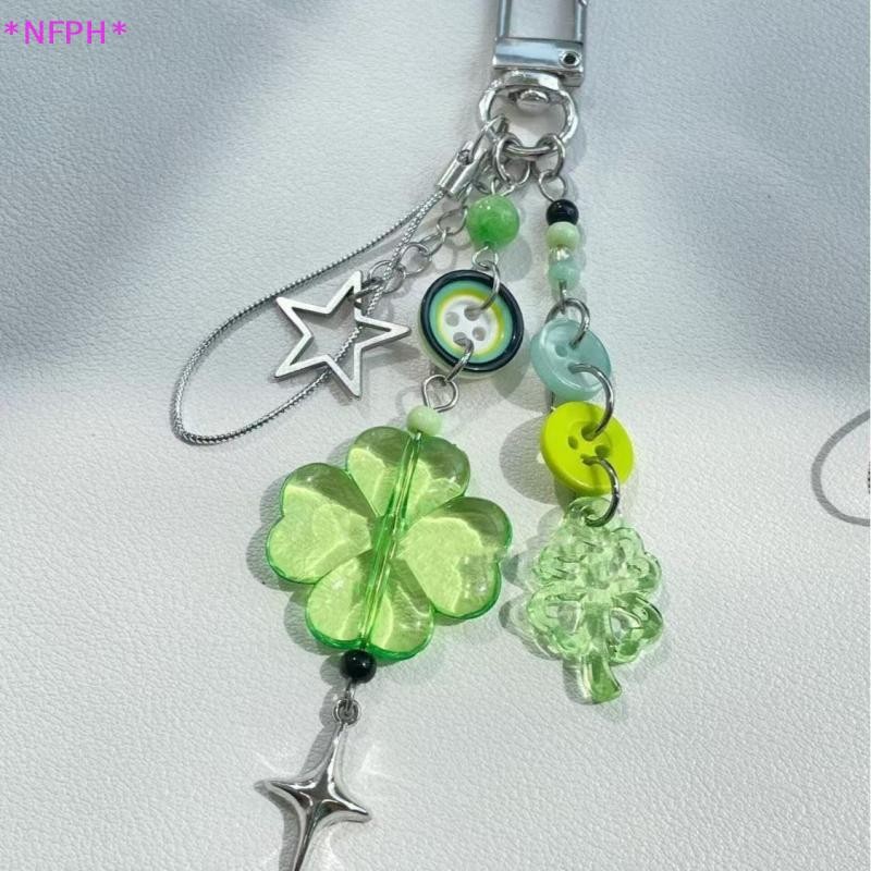 NFPH> 1ชิ้นดาวปุ่มที่มีสีสันจี้อะนิเมะสีเขียวสี่ใบโคลเวอร์คอสเพลย์พวงกุญแจโทรศัพท์โซ่เครื่องประดับอุปกรณ์เสริมอุปกรณ์ประกอบฉากใ