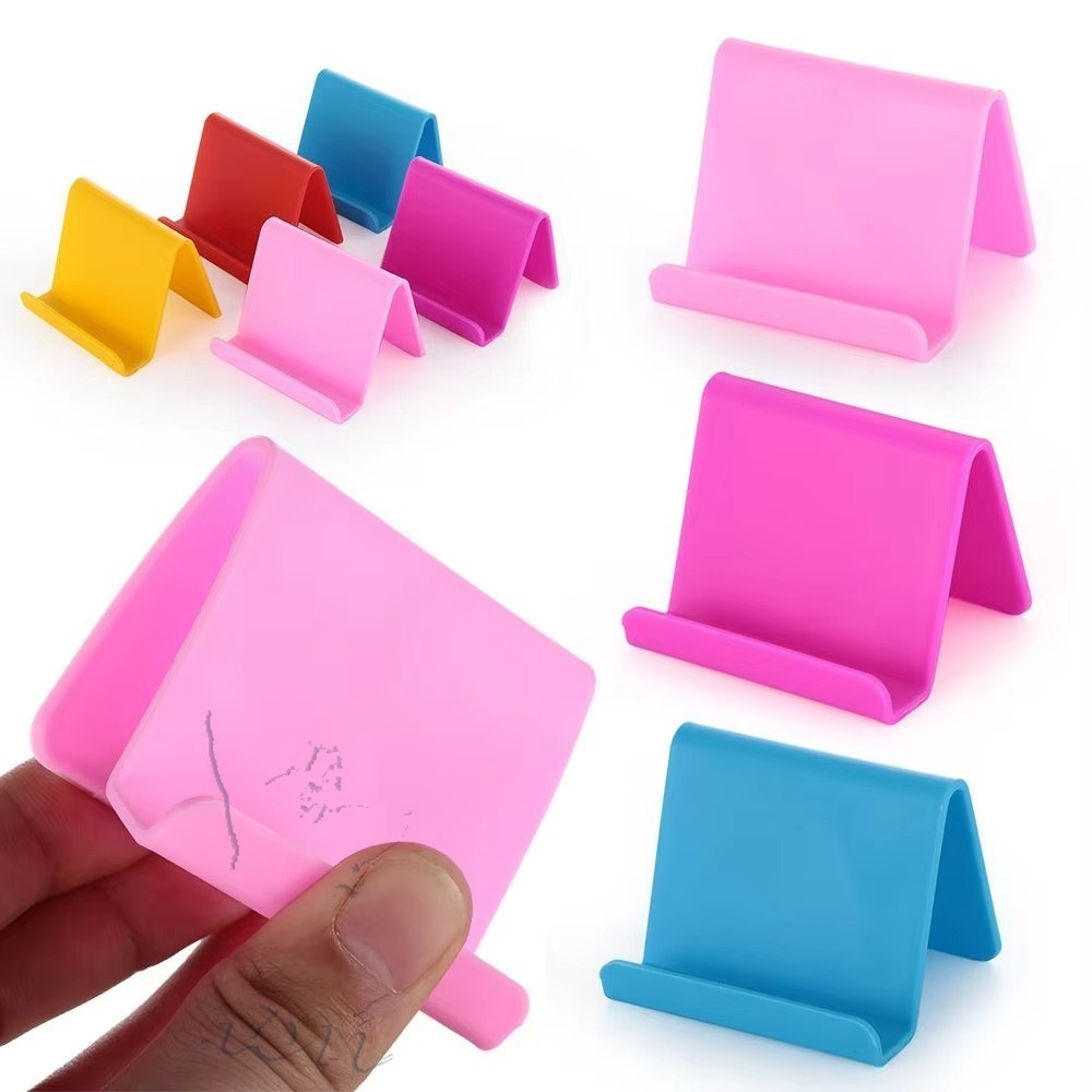 ที่วางโทรศัพท์มือถือแท็บเล็ตพีซียืนตั้งโต๊ะโต๊ะพลาสติกติดสีลูกกวาดสากลมินิแบบพกพ