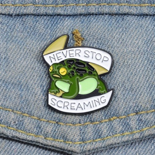 เข็มกลัดโลหะ รูปการ์ตูนกบ ข้อความ "Never Stop Screaming" Toad Hyla สร้างสรรค์ เครื่องประดับ สําหรับเสื้อผ้า ของขวัญ