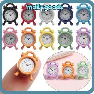 Moilyhd นาฬิกาปลุกตั้งโต๊ะ ทรงกลม ขนาดเล็ก สเกล 1:12 แบบพกพา สําหรับบ้านตุ๊กตา
