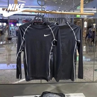 Nike แท้ 100% เสื้อยืดคอกลม แขนยาว ระบายอากาศ เหมาะกับการวิ่ง ออกกําลังกาย เล่นกีฬา DD1991