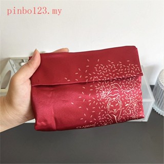 กระเป๋าเครื่องสําอาง ผ้าไหม แต่งพู่ สีแดง สําหรับปีใหม่