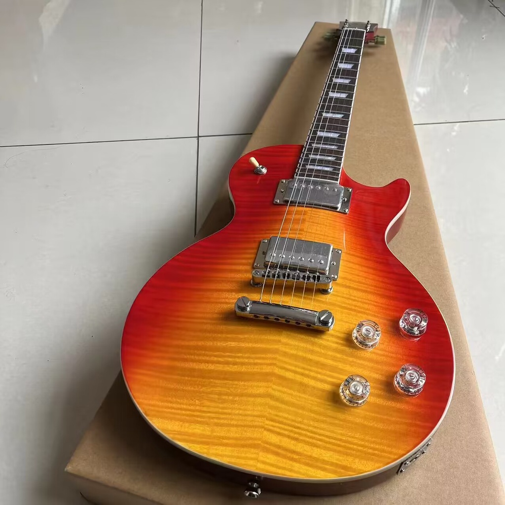 Gibson Les Paul กีตาร์ไฟฟ้ามาตรฐาน Sunset Flame Maple Top กีตาร์มืออาชีพ