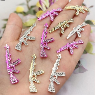 【ในการจัดส่ง】 10 ชิ้นสีชมพู 3d คริสตัล Rhinestone ปืนรูปร่างพังก์สไตล์เล็บ DIY เครื่องประดับเล็บโลหะผสมเสน่ห์โลหะเครื่องประดับ