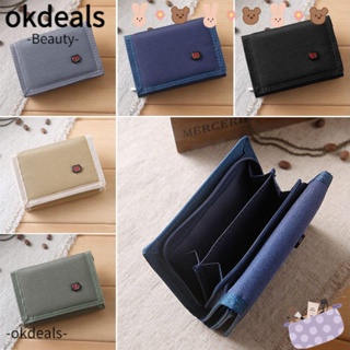 Okdeals กระเป๋าสตางค์ กระเป๋าใส่เหรียญ ผ้าแคนวาส แบบพับได้สามทบ อเนกประสงค์ แฟชั่นคลาสสิก สําหรับผู้หญิง และผู้ชาย