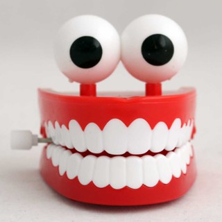  Jumping with eyes, big white teeth, spring up toy, trick game, prank props, shaking teeth toy