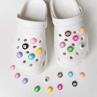 Jibits Crocs ช็อคโกแลต ลูกอม น่ารัก สําหรับเด็กผู้หญิง M&amp;M ถั่ว จิบบิต ชาร์ม น้ําตาล จิบิตซ์ ถ้วย รองเท้า อุปกรณ์เสริม จี้รองเท้า หมุดตกแต่ง