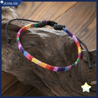 Jeanlan สร้อยข้อเท้า เชือกถัก ลายหัวใจ สีรุ้ง สไตล์โบฮีเมียน สําหรับผู้หญิง และผู้ชาย