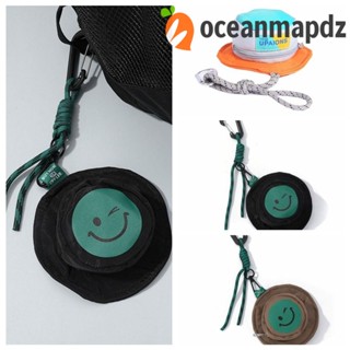 Oceanmapdz กระเป๋าหูฟัง ผ้าแคนวาส ทรงกลม ลายหน้ายิ้ม พร้อมพวงกุญแจ แบบพกพา ขนาดเล็ก สีแคนดี้