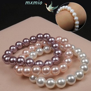 Mxmio สร้อยข้อมือ ประดับลูกปัดเปลือกหอย สีชมพู สีม่วง สีขาว 10 มม.