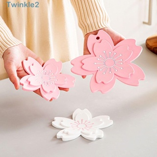 Twinkle แผ่นฉนวนกันความร้อน ซิลิโคน ทําความสะอาดง่าย บนโต๊ะอาหาร ปกป้องเดสก์ท็อป รูปดอกไม้ แขวนได้ ตกแต่งบ้าน ที่รองแก้วกันลื่น