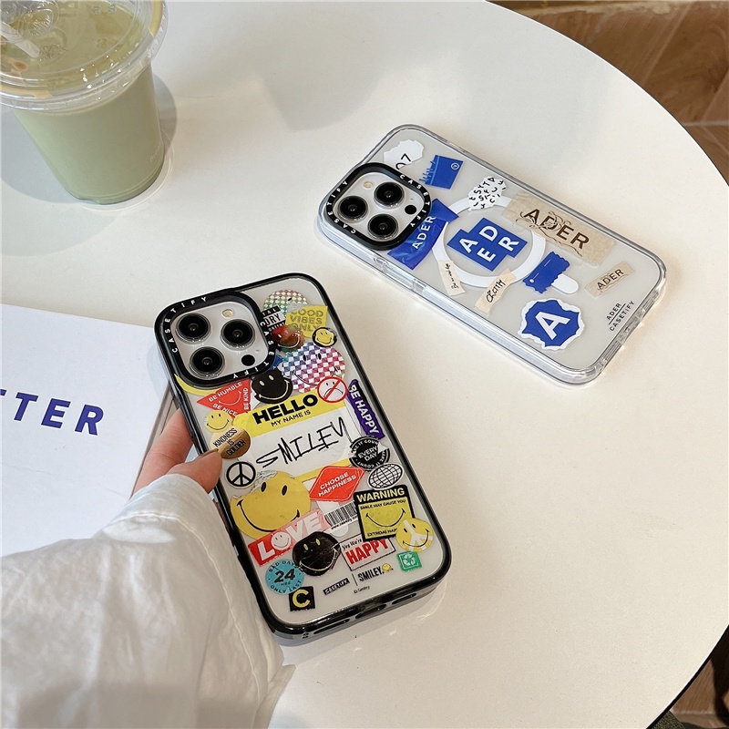 Casetify【ader Smile Tag】เคสโทรศัพท์มือถืออะคริลิค TPU นิ่ม แบบใส กันกระแทก ลายการ์ตูนโลโก้แกะสลัก สําหรับ iPhone 11 12 13 14 15 Pro MAX