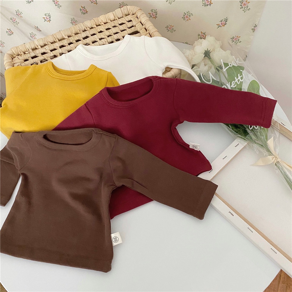เสื้อยืดแขนยาว คอกลม ผ้าฝ้ายแท้ สี่สี สีขาว แฟชั่นฤดูใบไม้ร่วง และฤดูหนาว สําหรับเด็กอายุ 0-2 ปี