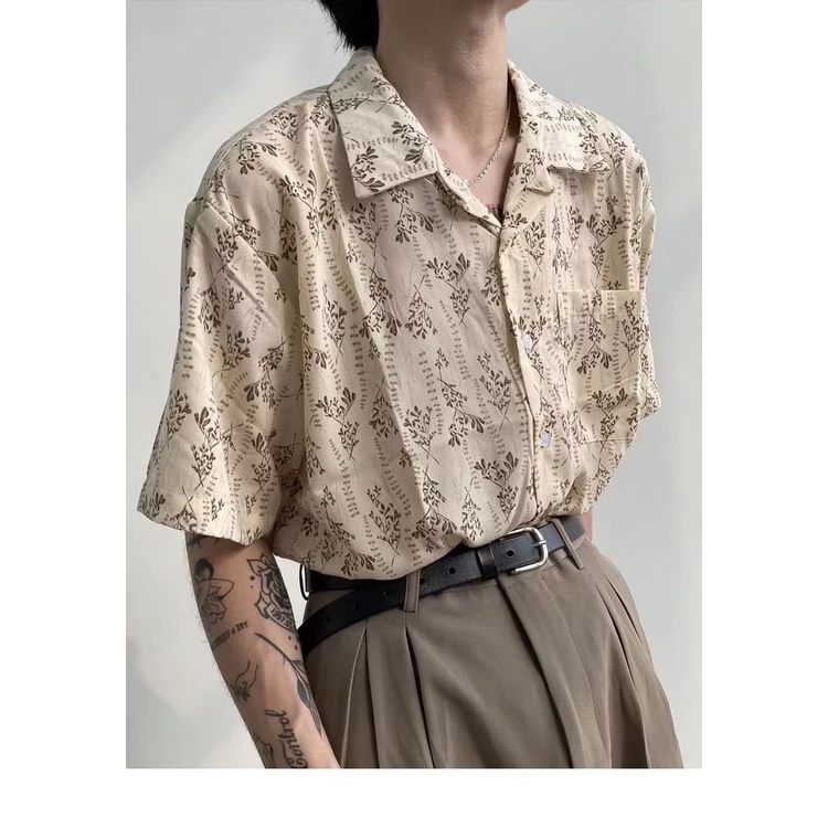 เสื้อเชิ้ตแขนสั้น คอปก ทรงหลวม ลายดอกไม้ สไตล์วินเทจ เหมาะกับเดินชายหาด แฟชั่นคู่รัก สําหรับผู้ชาย
