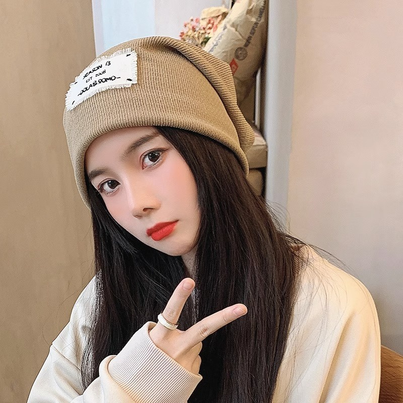 หมวกบีนนี่ถัก ผ้าฝ้ายนิ่ม พิมพ์ลายตัวอักษร ทรงหลวม สีพื้น แฟชั่นฤดูใบไม้ร่วง และฤดูหนาว สําหรับผู้ชาย และผู้หญิง