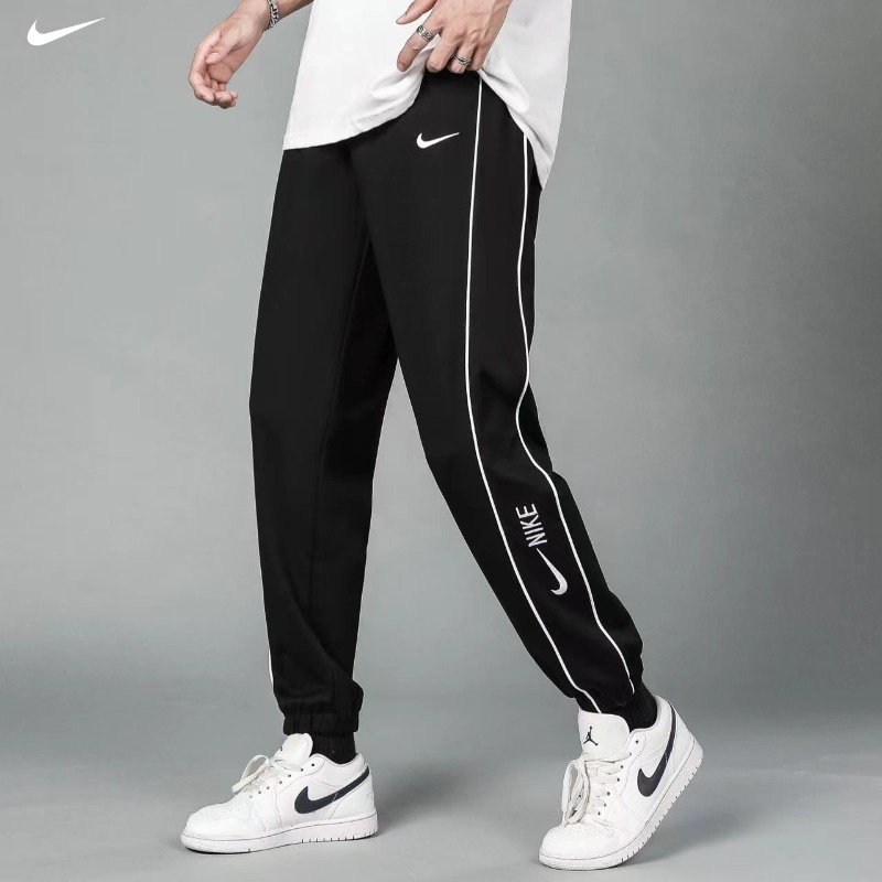 Nike ของแท้ 100% ใหม่ กางเกงวอร์ม ทรงหลวม ระบายอากาศ สําหรับผู้ชาย เหมาะกับการวิ่ง