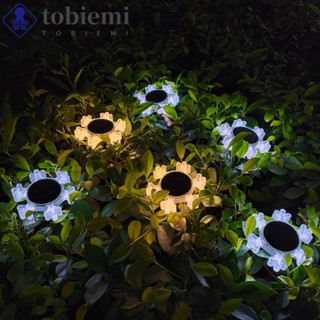 Tobiepz โคมไฟ LED รูปเกล็ดหิมะ พลังงานแสงอาทิตย์ กันน้ํา 600mah สําหรับตกแต่งรั้ว