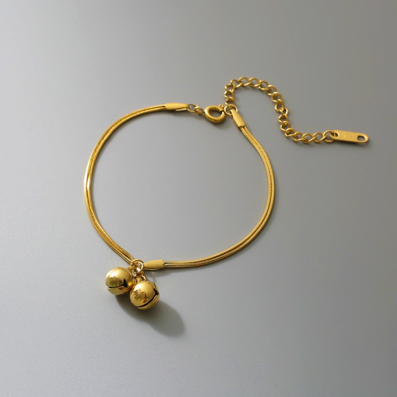 นาฬิกาไทเทเนียม พร้อมสร้อยข้อมือเสียง ทอง 18K สเตนเลส สร้อยข้อมือผู้หญิง สร้อยข้อมือ ย้อนยุค ไม่ซีดจาง
