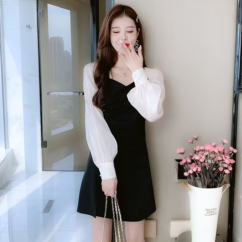 สไตล์ใหม่สง่างามความรู้สึกการออกแบบย้อนยุคสไตล์ชาแนลเอวแคบ ผอมลง ดูฤดูใบไม้ผลิฤดูใบไม้ร่วงแขนยาวชุดสีดําเล็กๆน้อยๆ