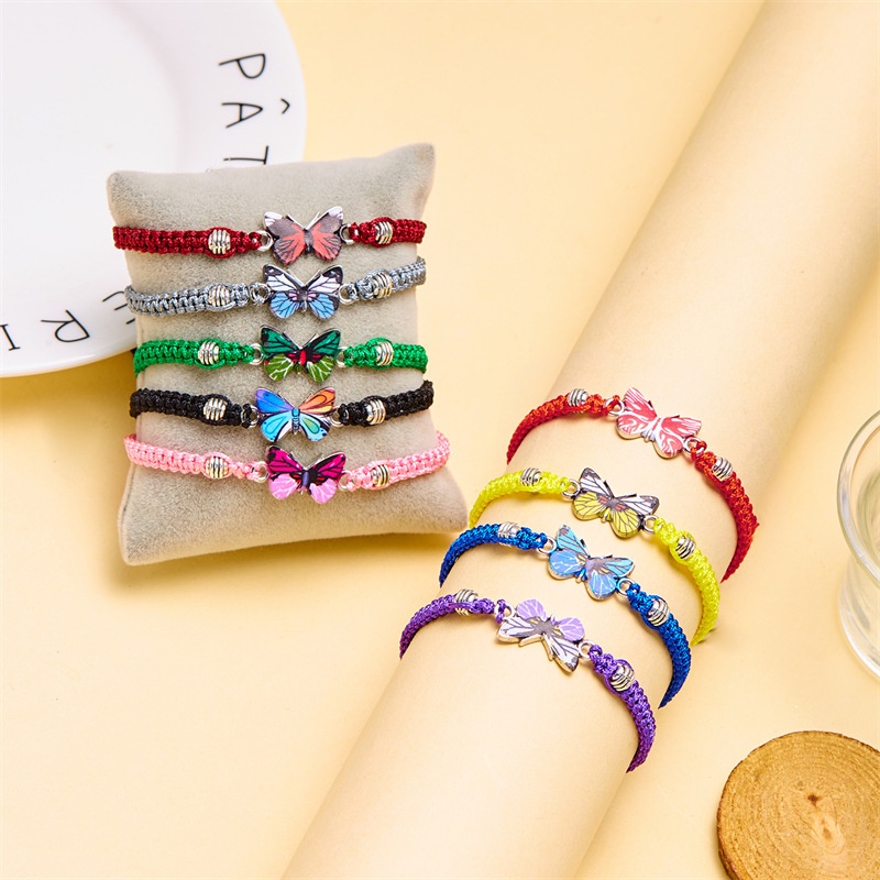 สร้อยข้อมือ กําไลข้อมือถัก จี้ผีเสื้อ สีพื้น หลากสี ปรับได้ ของขวัญปาร์ตี้ สําหรับผู้หญิง