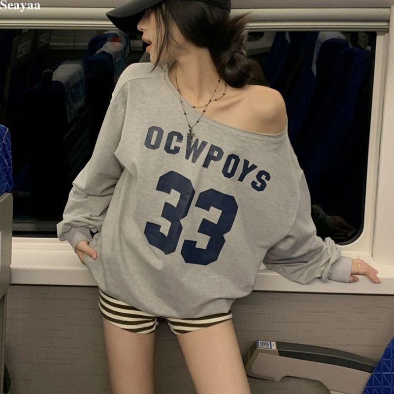 สาวร้อนลำลองหลวมเสื้อยืดตัวอักษรย้อนยุคพิมพ์เสื้อยืดแขนยาวปิดไหล่ด้านบน SY